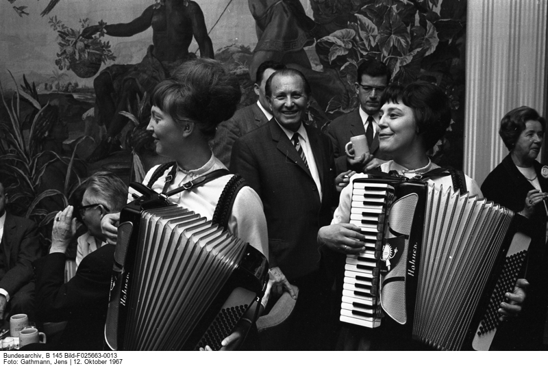 Two female accordion players performing